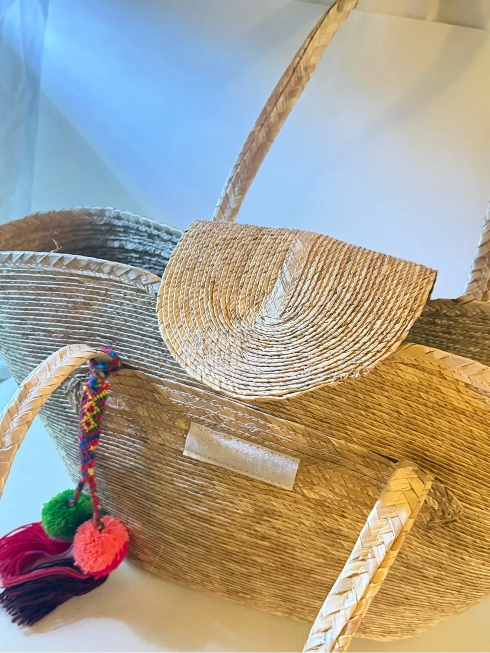 Handwoven Straw Tote Bag with Colorful Pom Pom Charm - Natural